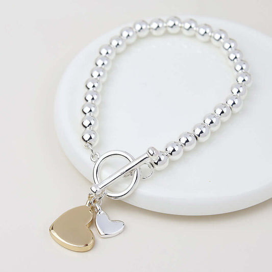 POM925 - Silver plated stretch beaded and double hearts charm bracelet