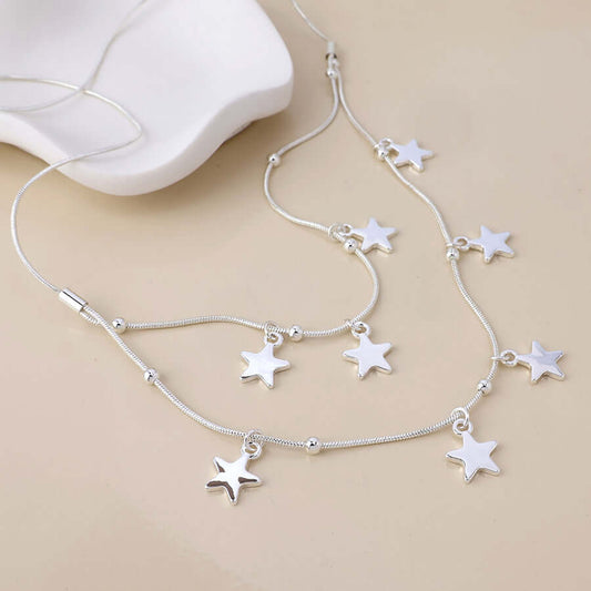 POM925 - Stardust silver plated double strand star drops necklace