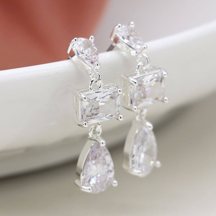 POM - Silver plated triple crystal drop earrings