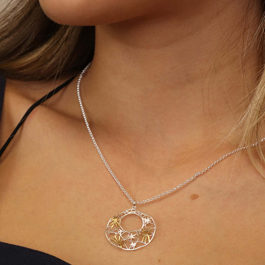 POM - Silver plated and golden irregular jali floral necklace