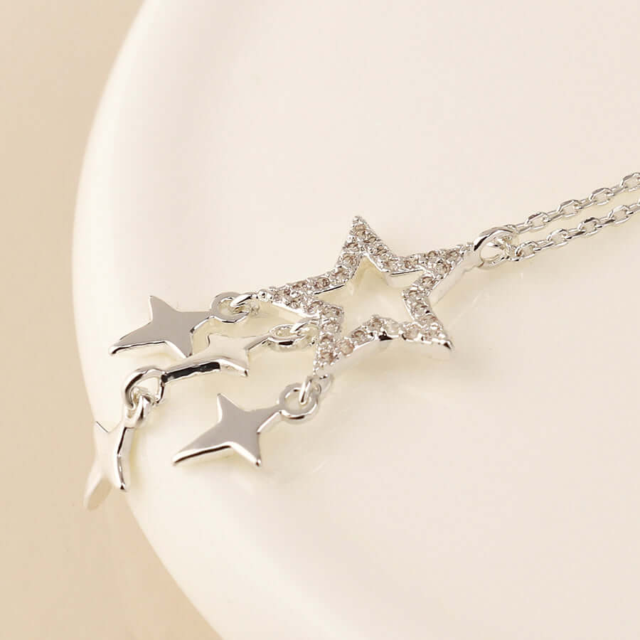 POM - Silver plated crystal star and star drops necklace