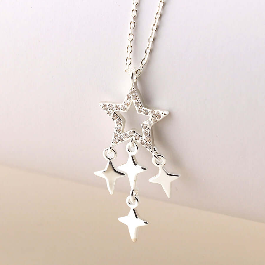 POM - Silver plated crystal star and star drops necklace