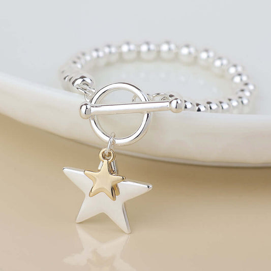 POM925 - Silver plated and golden double star charm bracelet
