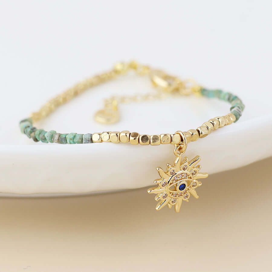 POM925 - Golden and turquoise bracelet with crystal sun charm