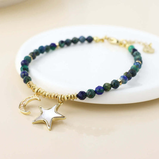 POM925 - Golden and dark bead moon and star charm bracelet