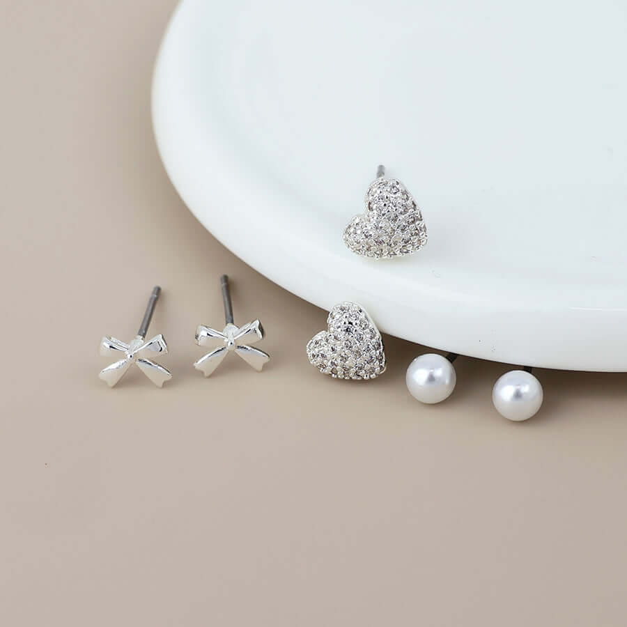 POM925 - Bo silver plated pearl, heart and bow earring set