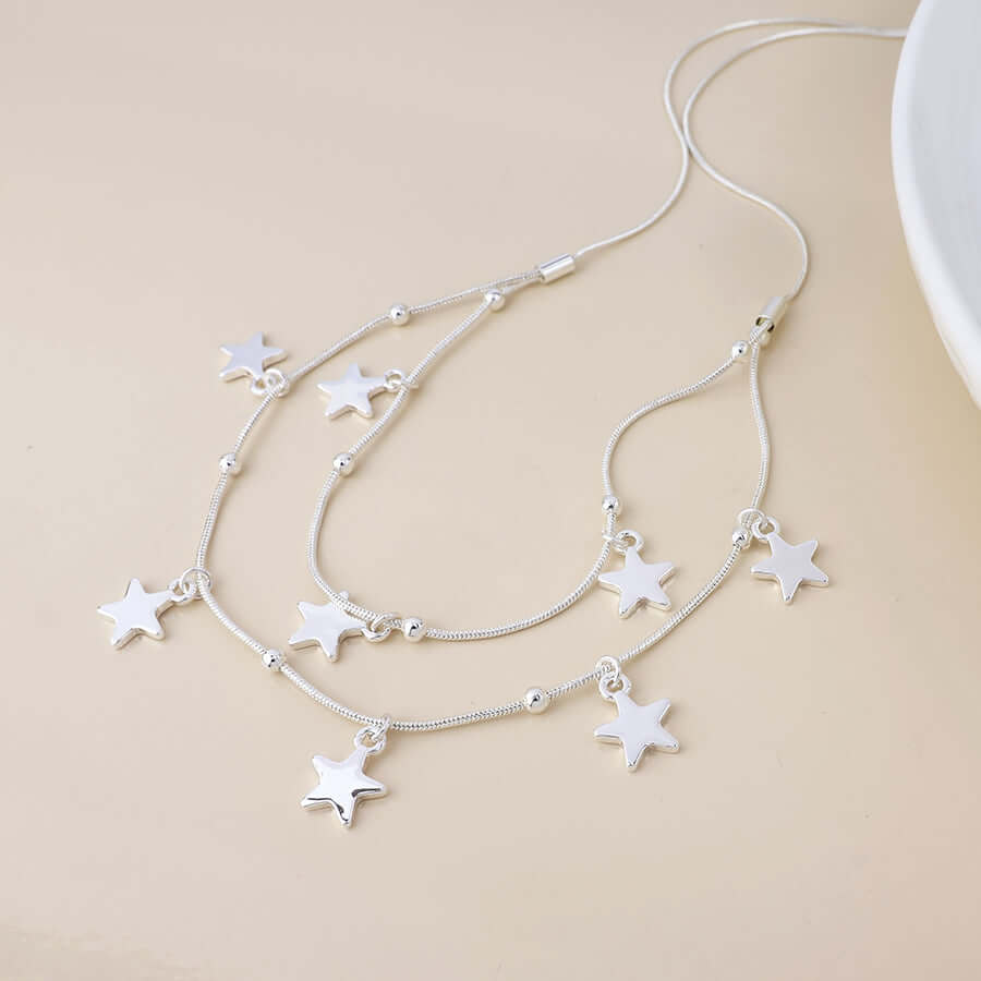 POM925 - Stardust silver plated double strand star drops necklace