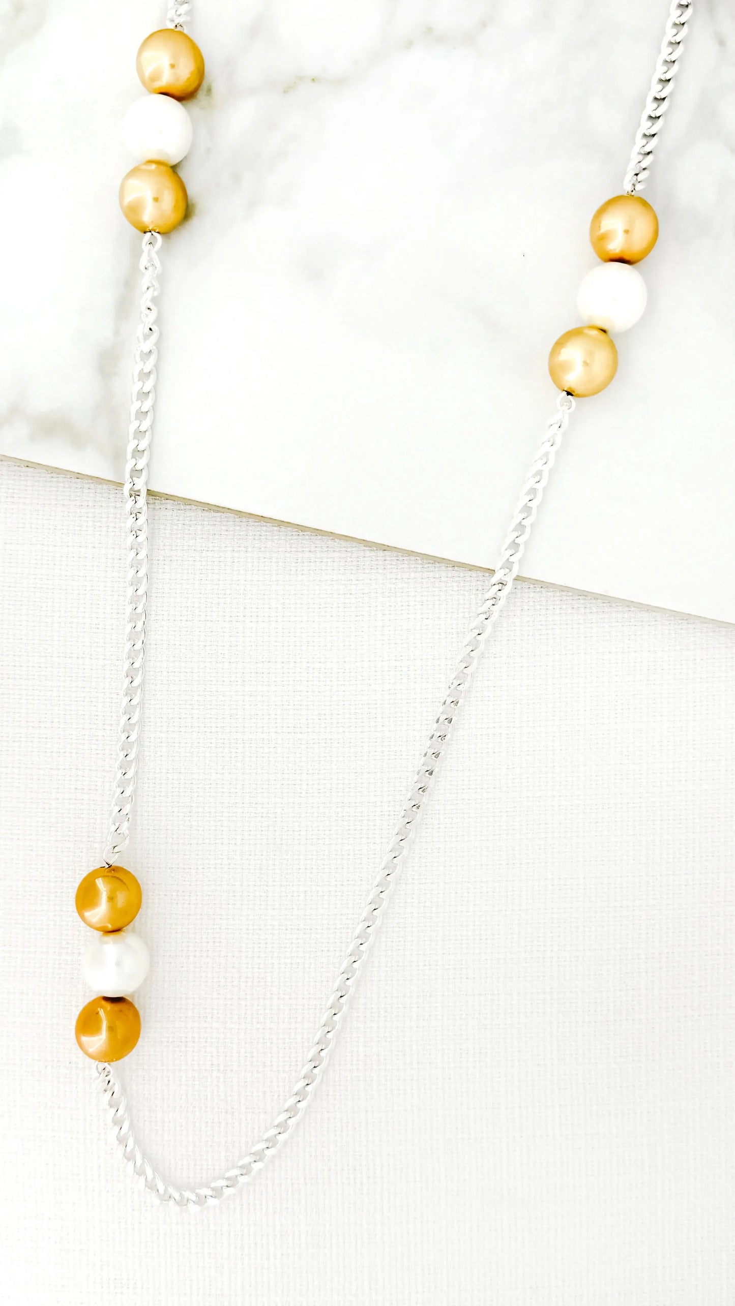 Envy Jewellery - Long silver necklace with gold and pearl balls