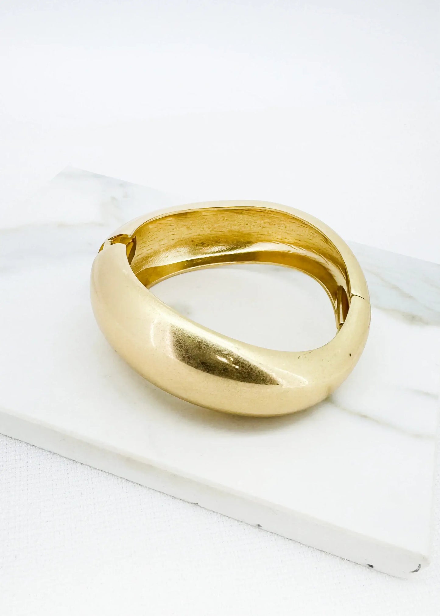 Envy Jewellery - Worn gold wide hinged bangle