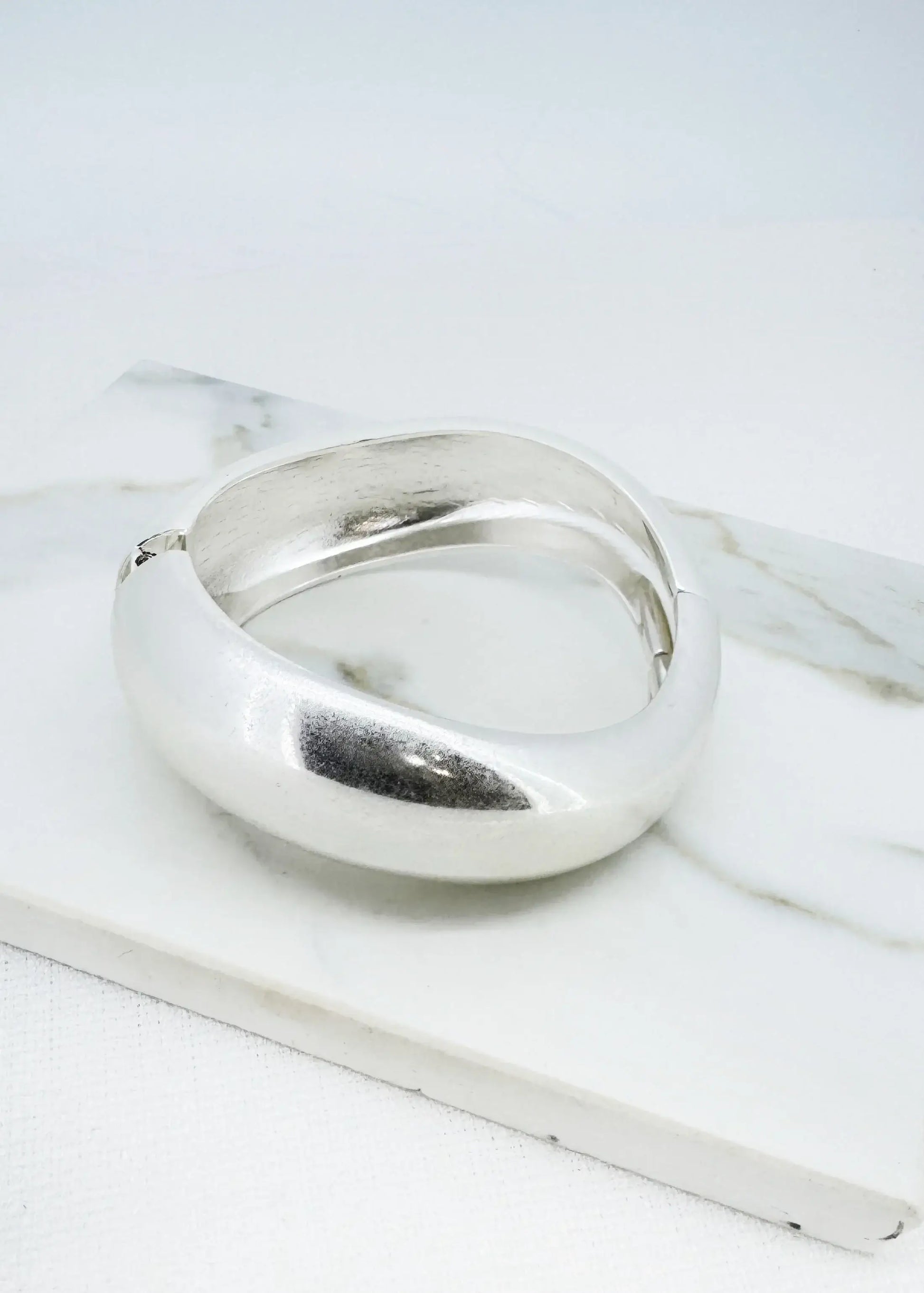 Envy Jewellery - Worn silver wide hinged bangle