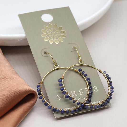 POM - Gold plated hoop earrings with sodalite beads