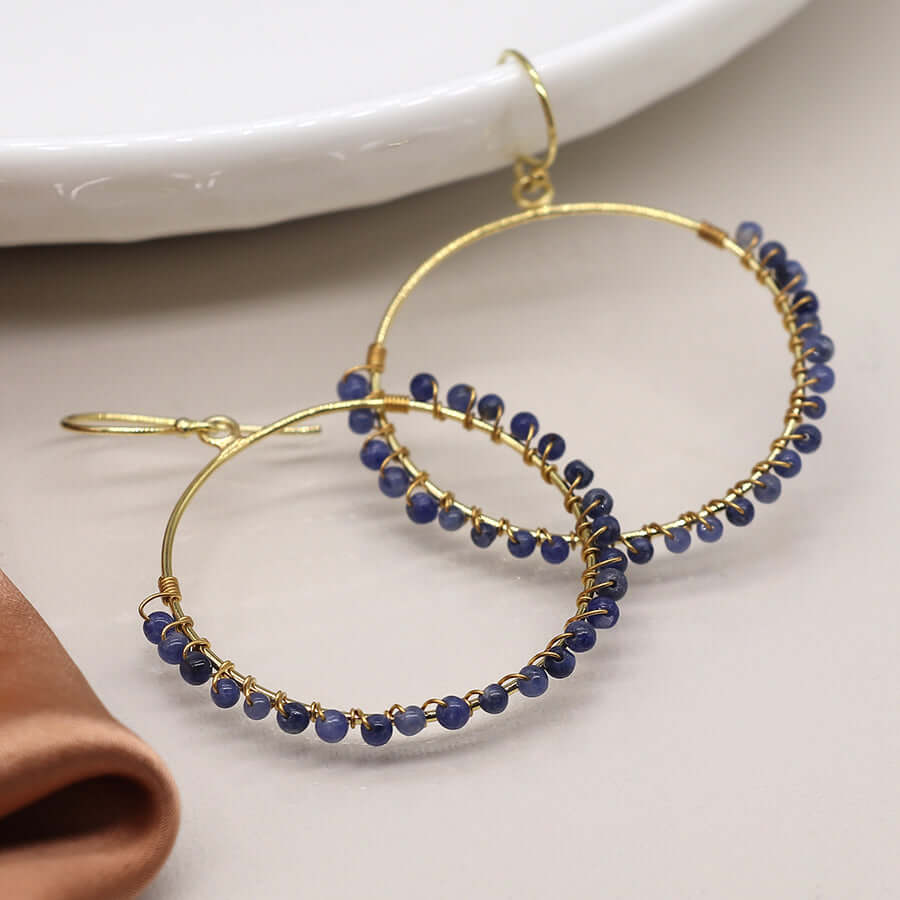 POM - Gold plated hoop earrings with sodalite beads