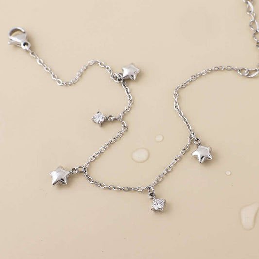 POM925 - Contstance stainless steel platinum plated stars and crystals station bracelet