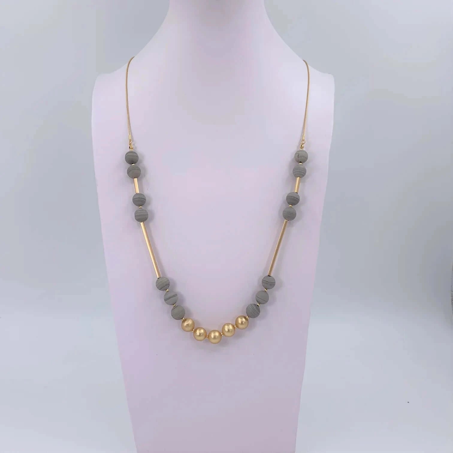Long semi precious bead necklace with gold plated bead section
