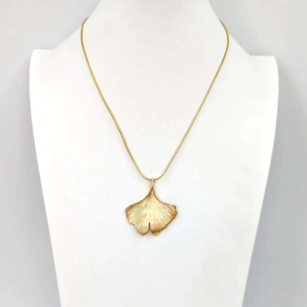 Ginko leaf pendant necklace on snake chain - gold